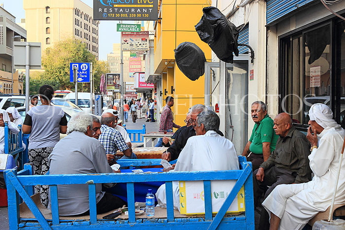 BAHRAIN, Manama, traditional coffee house, people playing cards, BHR1281JPL