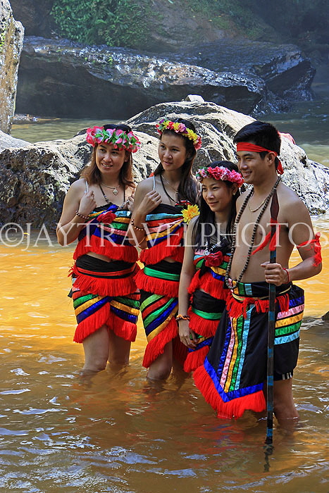 CAMBODIA, Siem Reap Prov, Kulen Mountain, locals posing in traditional Mondulkiri attire, CAM2438JPL