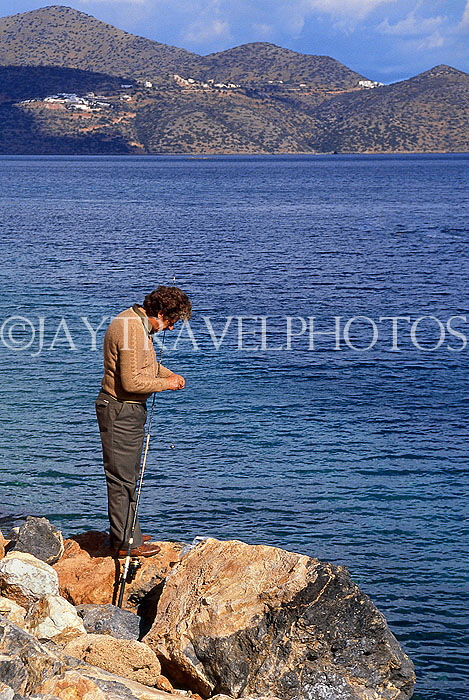 Greek Islands, CRETE, Elounda, fisherman with rod, GIS1283JPL