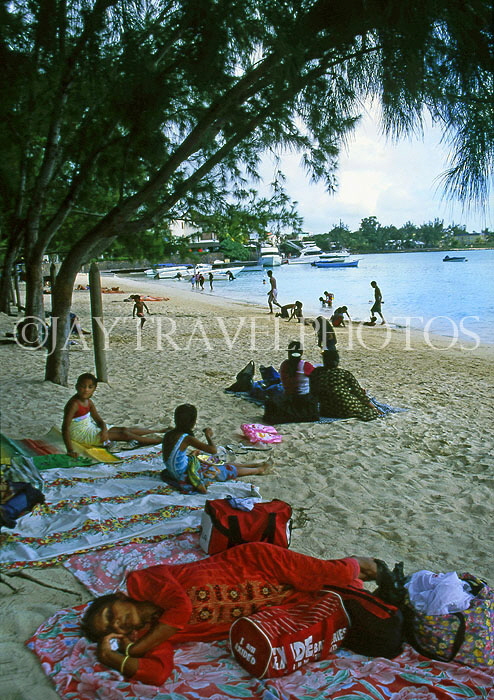 MAURITIUS, North Coast, Grand Bay, locals on public beach, MRU207JPL