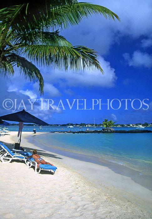 MAURITIUS, North Coast beaches, near Grand Bay, sunshade and sunbather, MRU221JPL