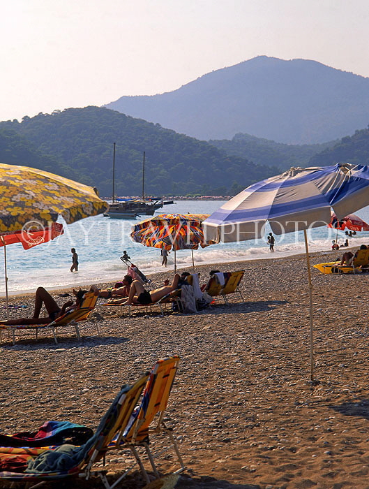TURKEY, Fethiye area, coast and beach with sunshades, TUR344JPL